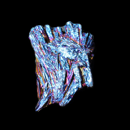 Titanium electroplated Tourmaline feather crystal 5.7g in sunlight - Rocks and Things Store