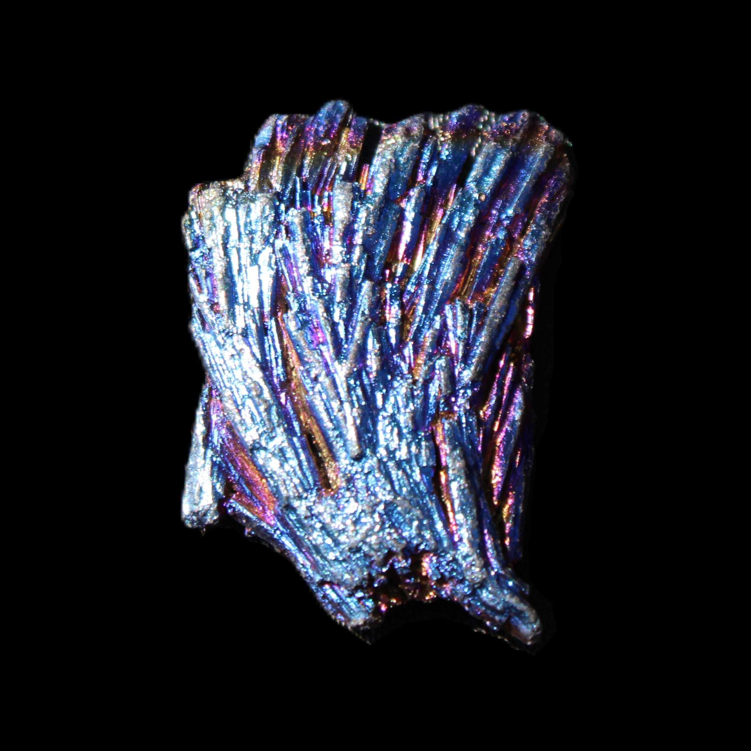 Titanium electroplated Tourmaline feather crystal 5.7g in sunlight - Rocks and Things Store