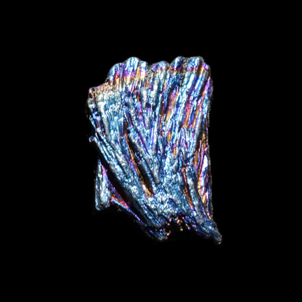 Titanium electroplated Tourmaline feather crystal 5.7g in sunlight - Rocks and Things Store