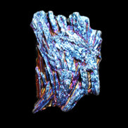 Titanium electroplated Tourmaline feather crystal 5.7g in sunlight - Rocks and Things Store