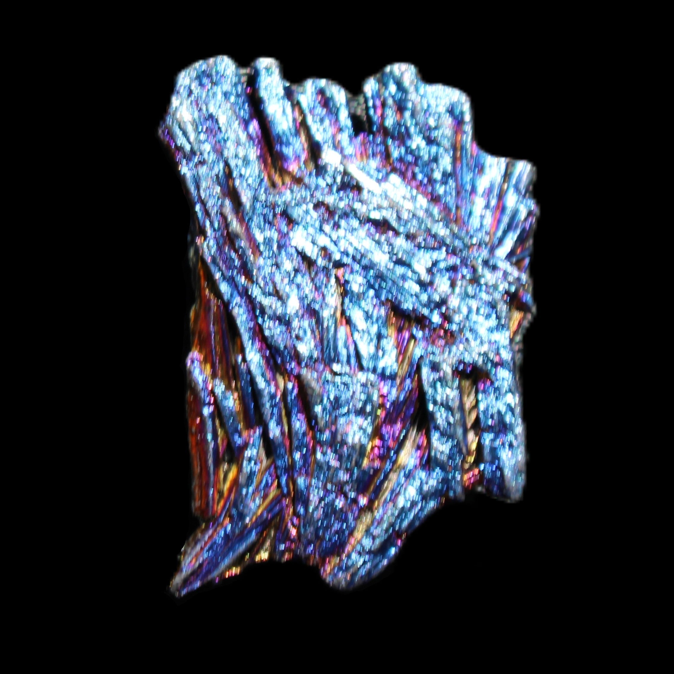 Titanium electroplated Tourmaline feather crystal 5.7g in sunlight - Rocks and Things Store