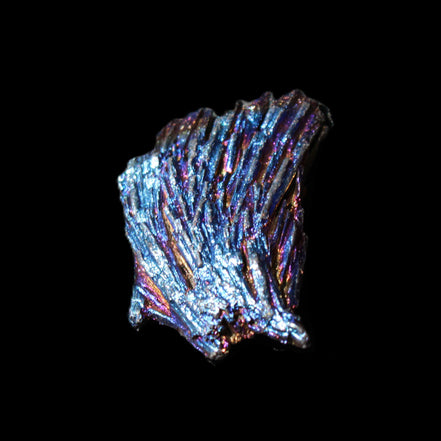 Titanium electroplated Tourmaline feather crystal 5.7g in sunlight - Rocks and Things Store