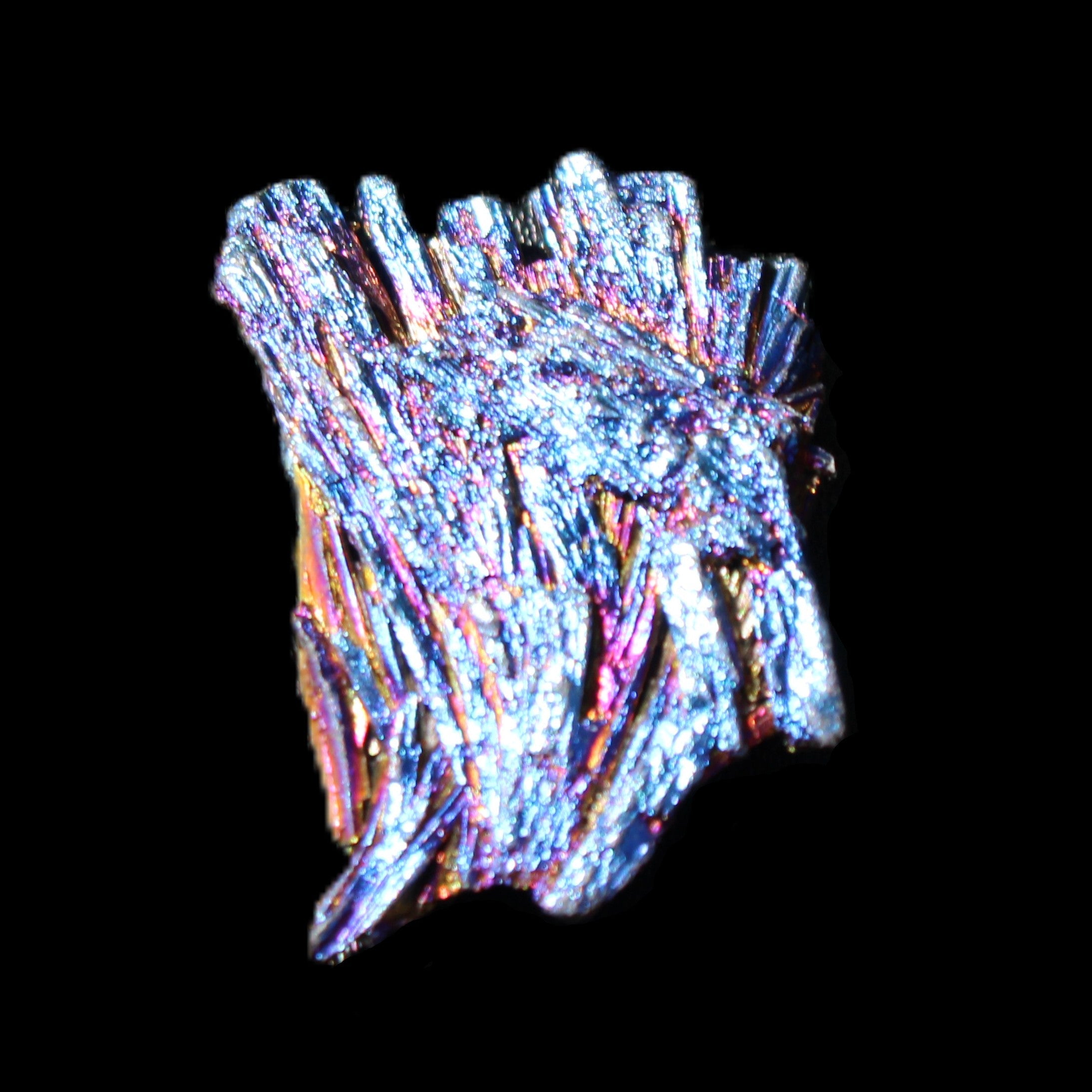 Titanium electroplated Tourmaline feather crystal 5.7g in sunlight - Rocks and Things Store