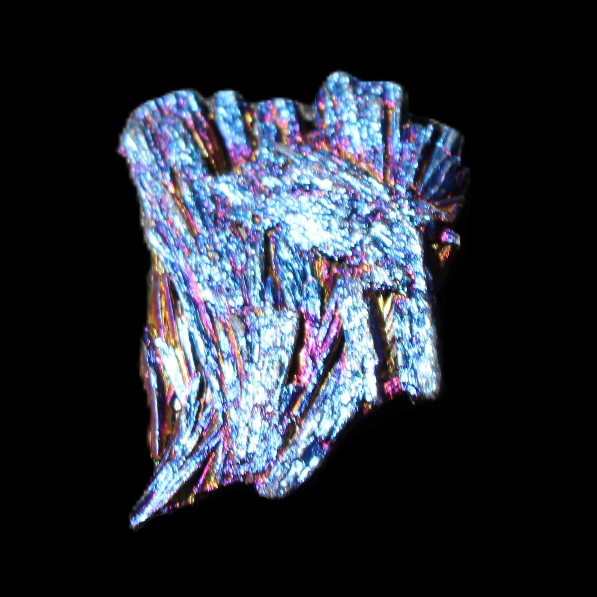 Titanium electroplated Tourmaline feather crystal 5.7g in sunlight - Rocks and Things Store