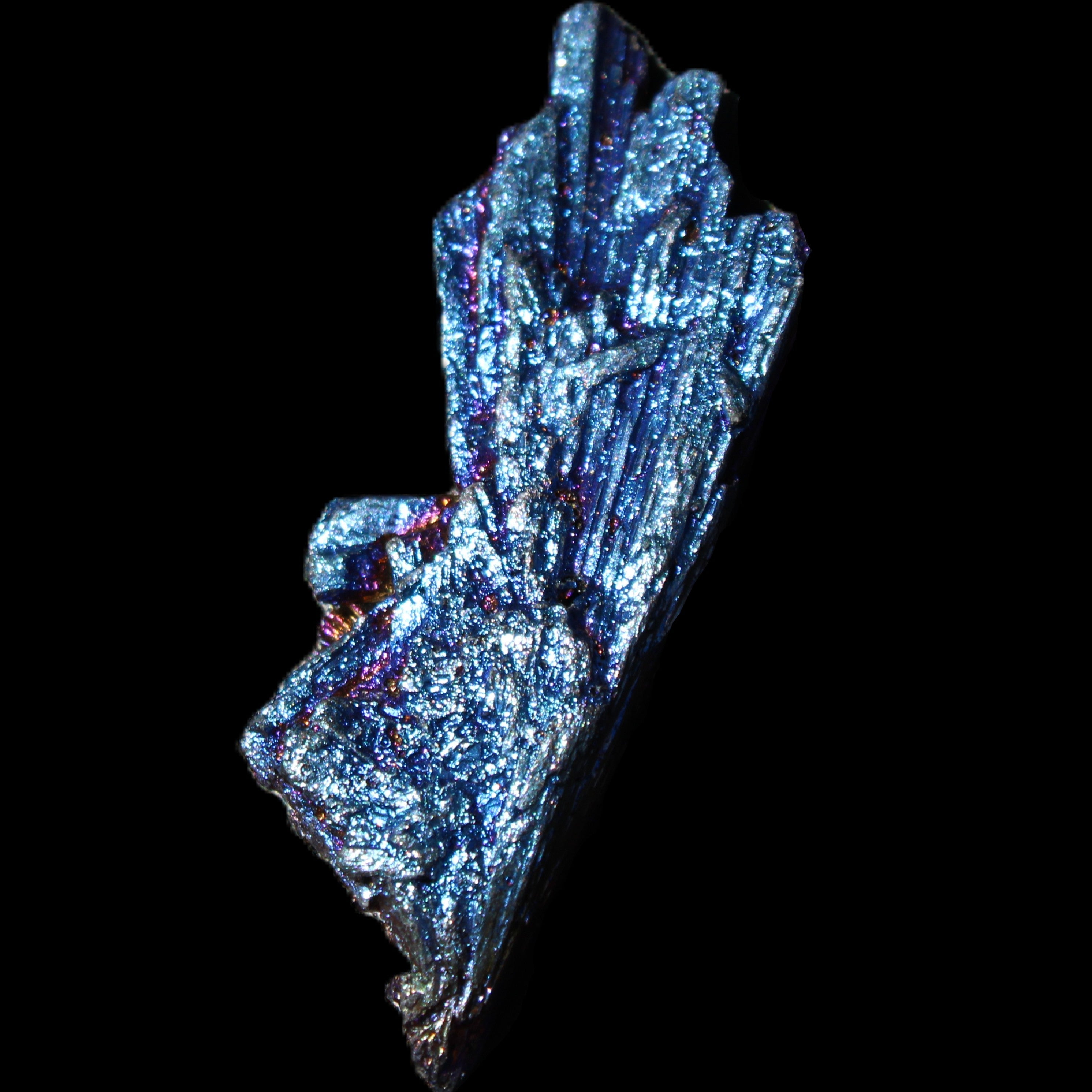 Titanium electroplated Tourmaline feather crystal 8/9g in sunlight - Rocks and Things Store