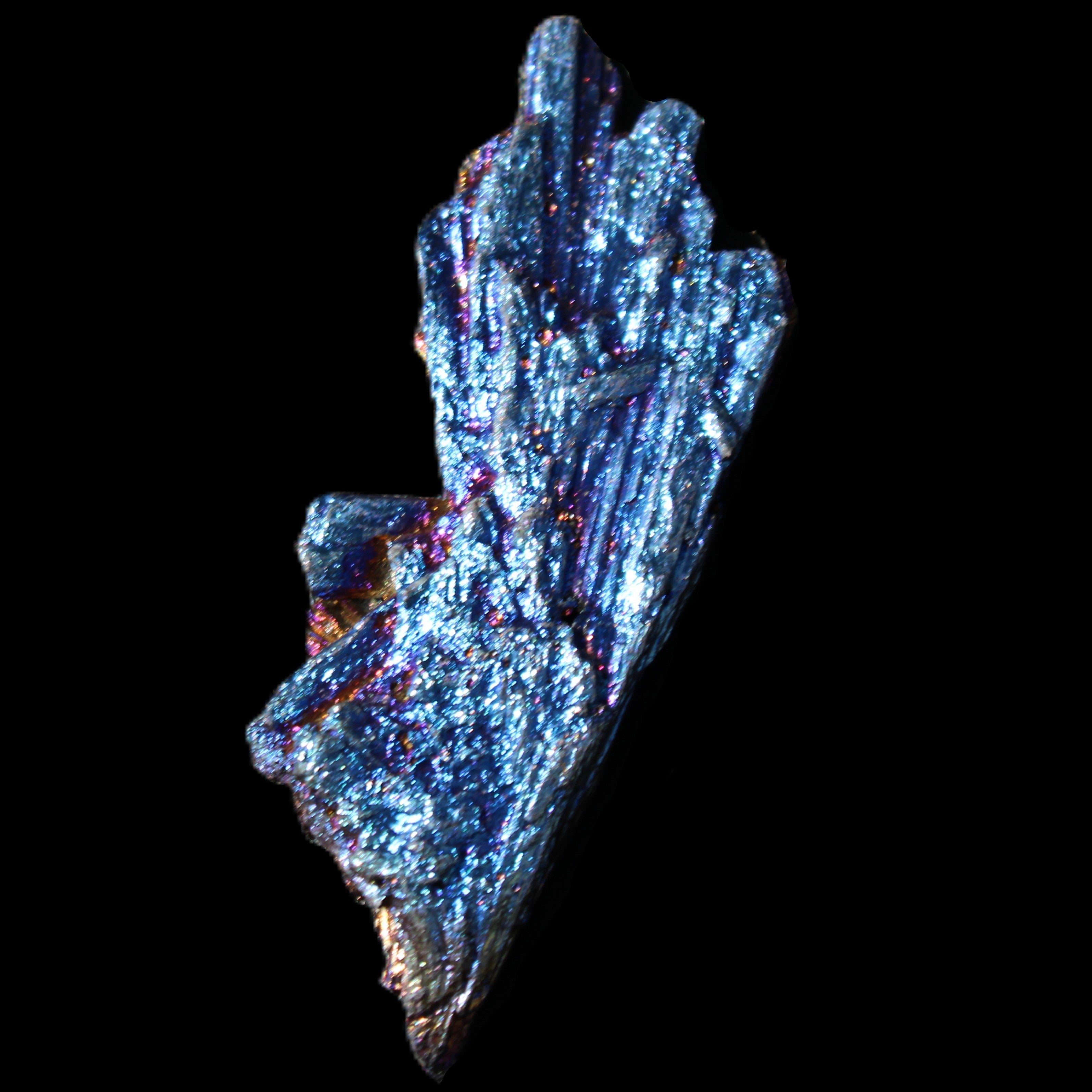 Titanium electroplated Tourmaline feather crystal 8/9g in sunlight - Rocks and Things Store