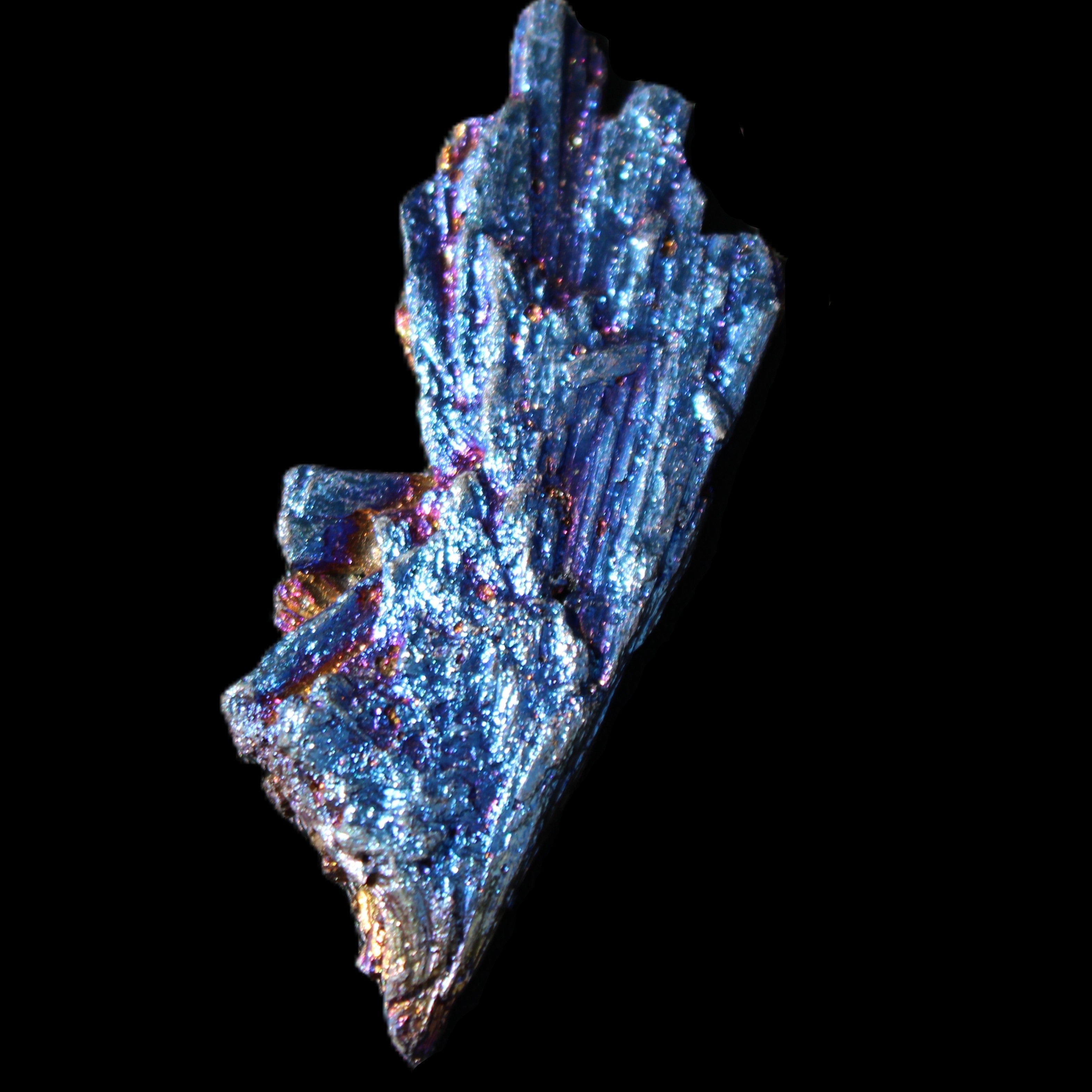 Titanium electroplated Tourmaline feather crystal 8/9g in sunlight - Rocks and Things Store