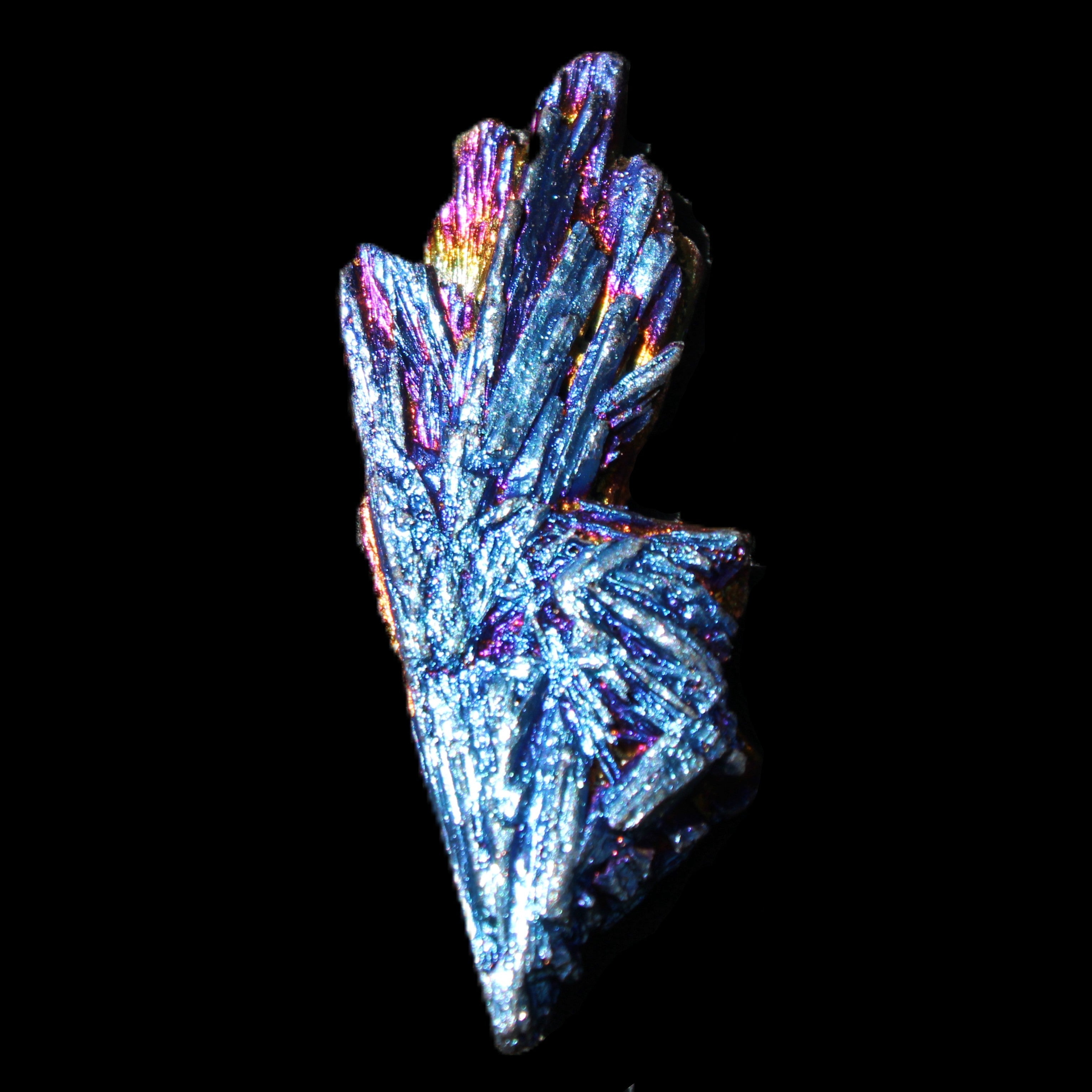 Titanium electroplated Tourmaline feather crystal 8/9g in sunlight - Rocks and Things Store