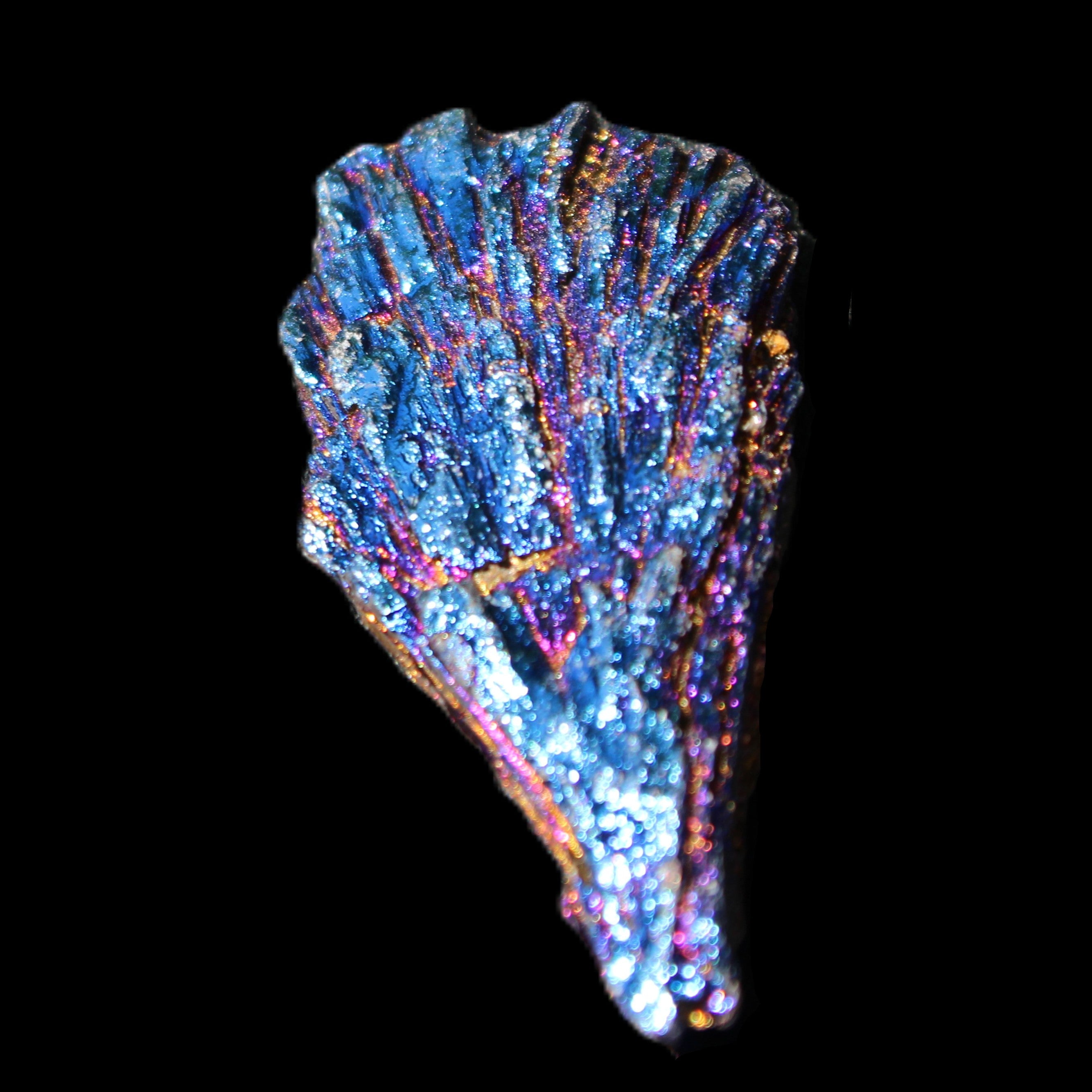 Titanium electroplated Tourmaline feather crystal 8/9g in sunlight - Rocks and Things Store