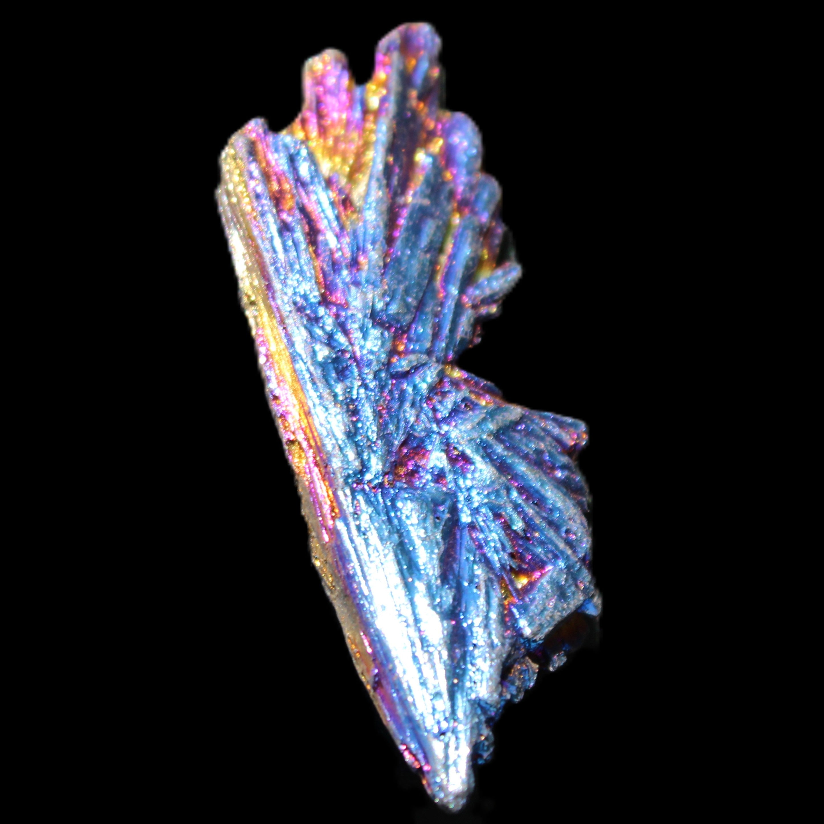 Titanium electroplated Tourmaline feather crystal 8/9g in sunlight - Rocks and Things Store