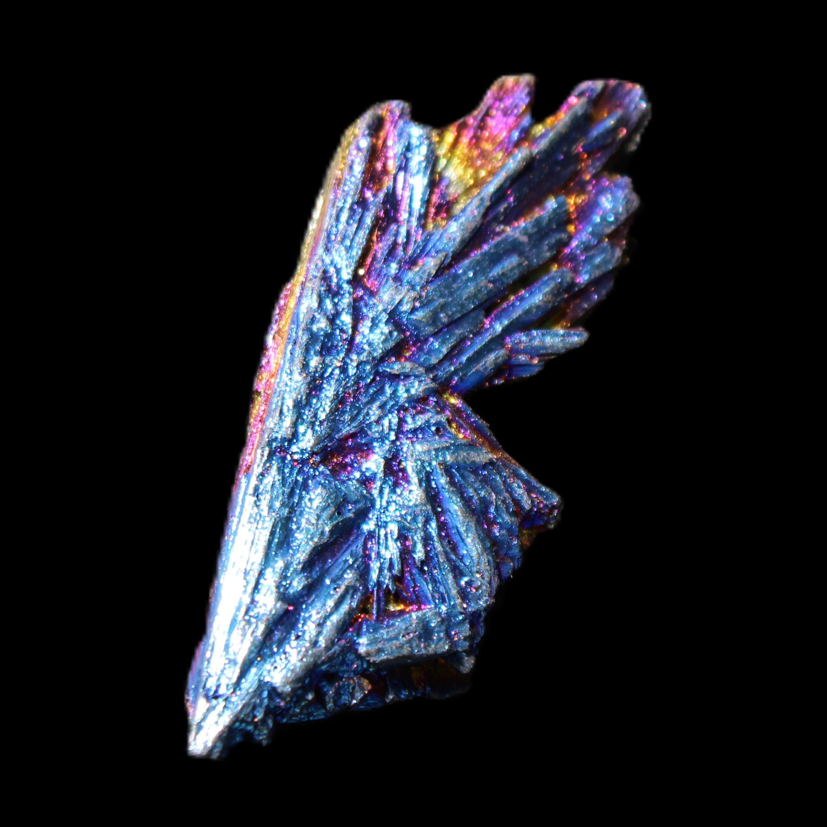 Titanium electroplated Tourmaline feather crystal 8/9g in sunlight - Rocks and Things Store