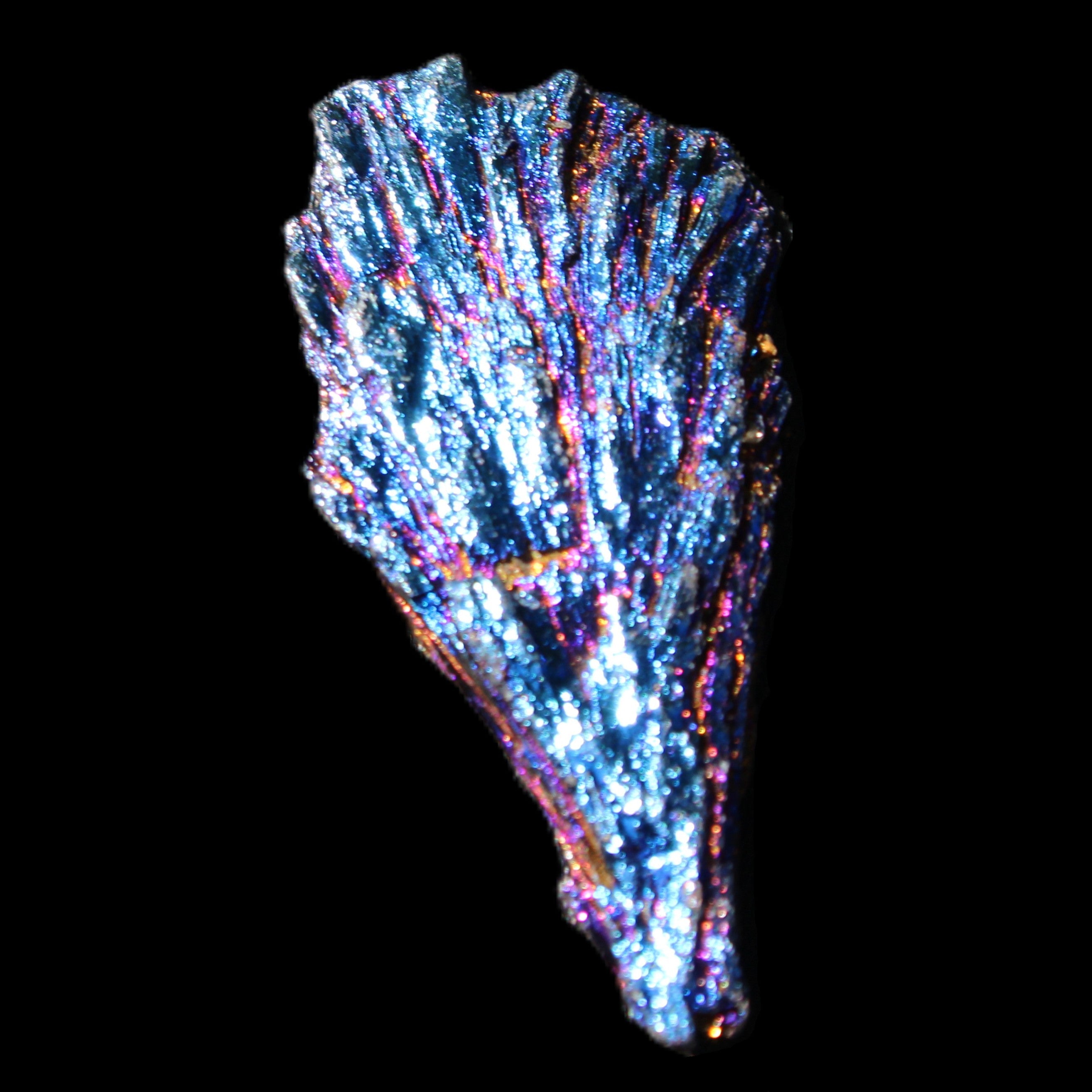 Titanium electroplated Tourmaline feather crystal 8/9g in sunlight - Rocks and Things Store