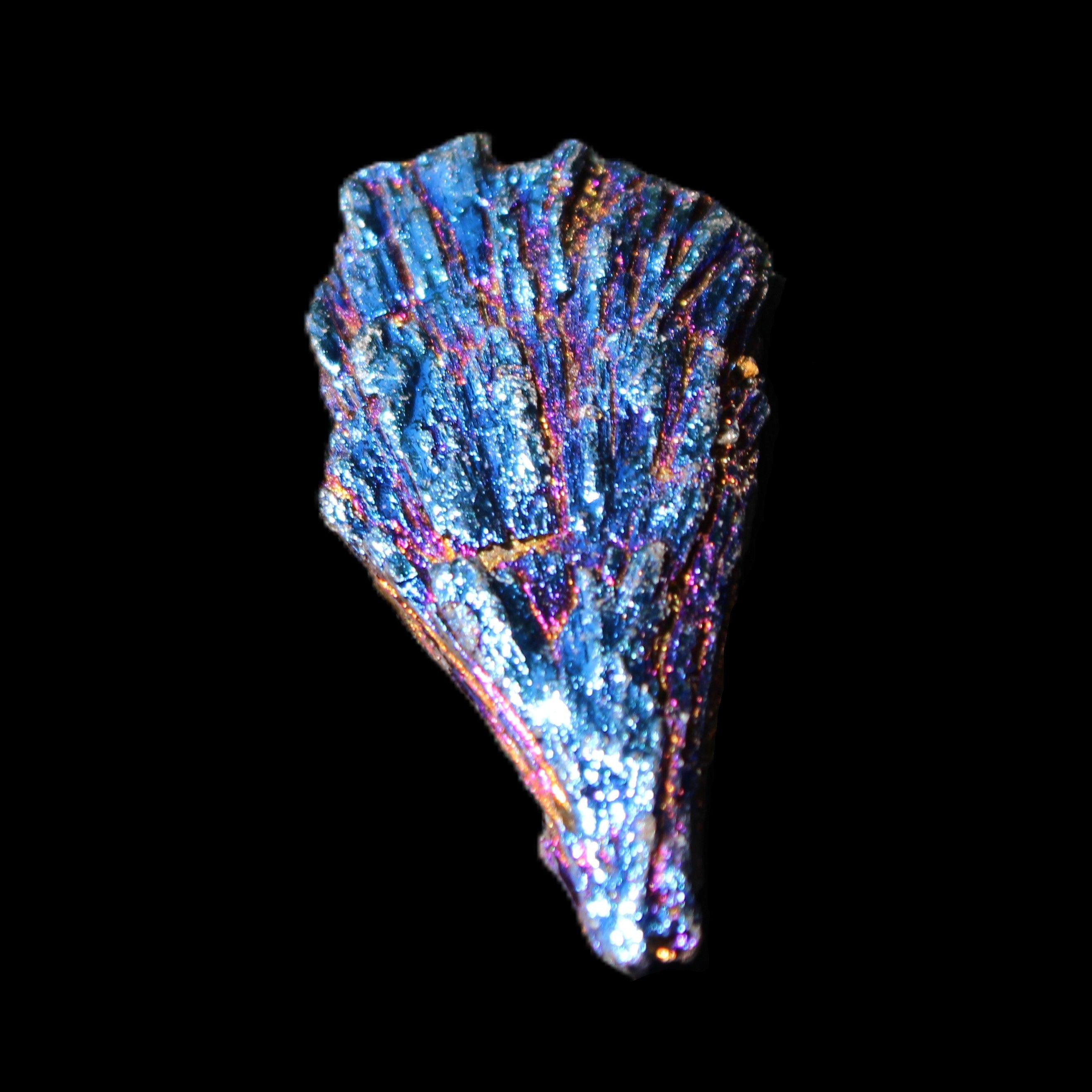 Titanium electroplated Tourmaline feather crystal 8/9g in sunlight - Rocks and Things Store