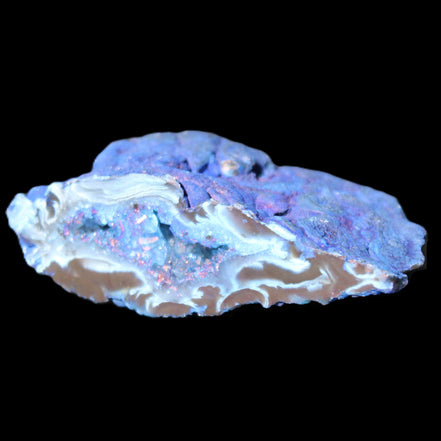 Blue dyed Agate geode 51*34*18mm 32g in sunlight - Rocks and Things Store
