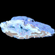 Blue dyed Agate geode 51*34*18mm 32g in sunlight - Rocks and Things Store