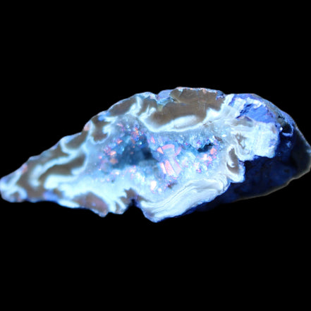 Blue dyed Agate geode 51*34*18mm 32g in sunlight - Rocks and Things Store