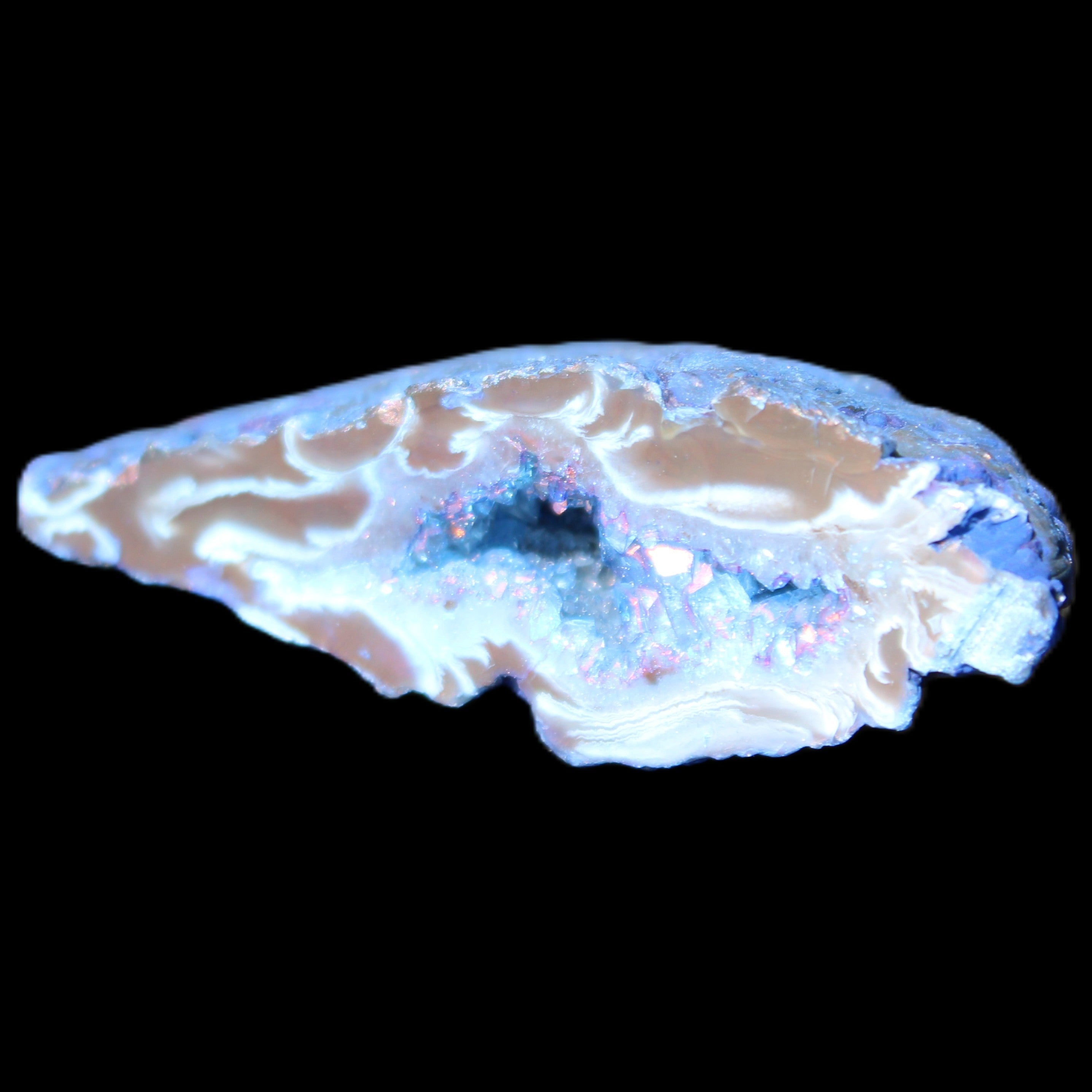 Blue dyed Agate geode 51*34*18mm 32g in sunlight - Rocks and Things Store