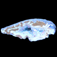 Blue dyed Agate geode 51*34*18mm 32g in sunlight - Rocks and Things Store