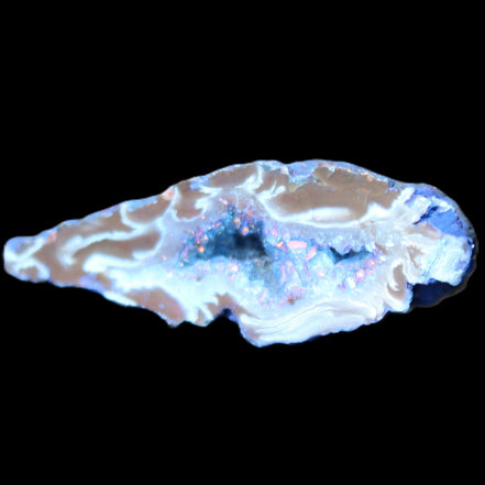 Blue dyed Agate geode 51*34*18mm 32g in sunlight - Rocks and Things Store
