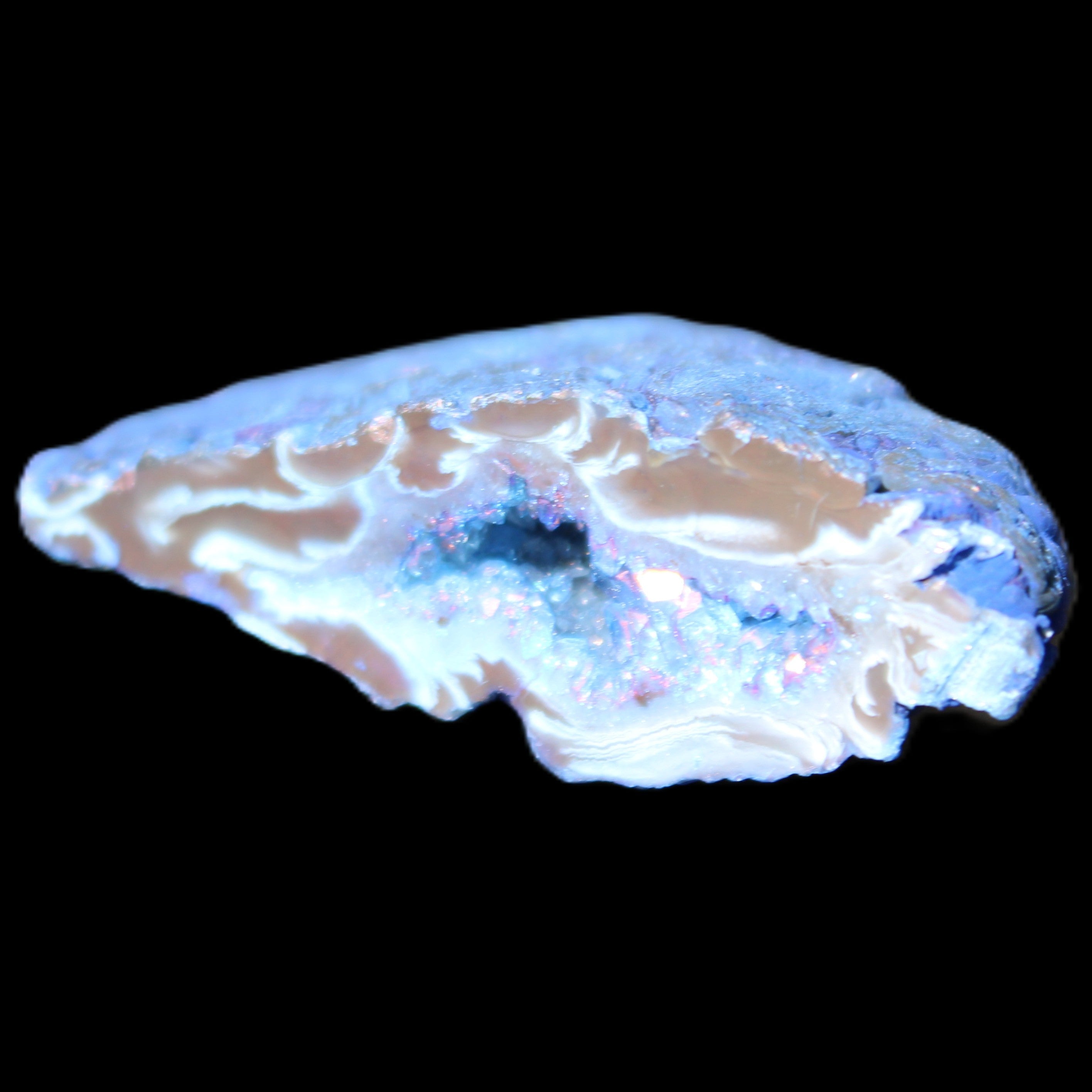 Blue dyed Agate geode 51*34*18mm 32g in sunlight - Rocks and Things Store
