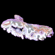 Violet dyed Agate geode 54*20*33mm 31g in sunlight - Rocks and Things Store