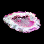 Magenta dyed Agate geode 49*21*15mm 21g in sunlight - Rocks and Things Store