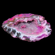 Magenta dyed Agate geode 49*21*15mm 21g in sunlight - Rocks and Things Store