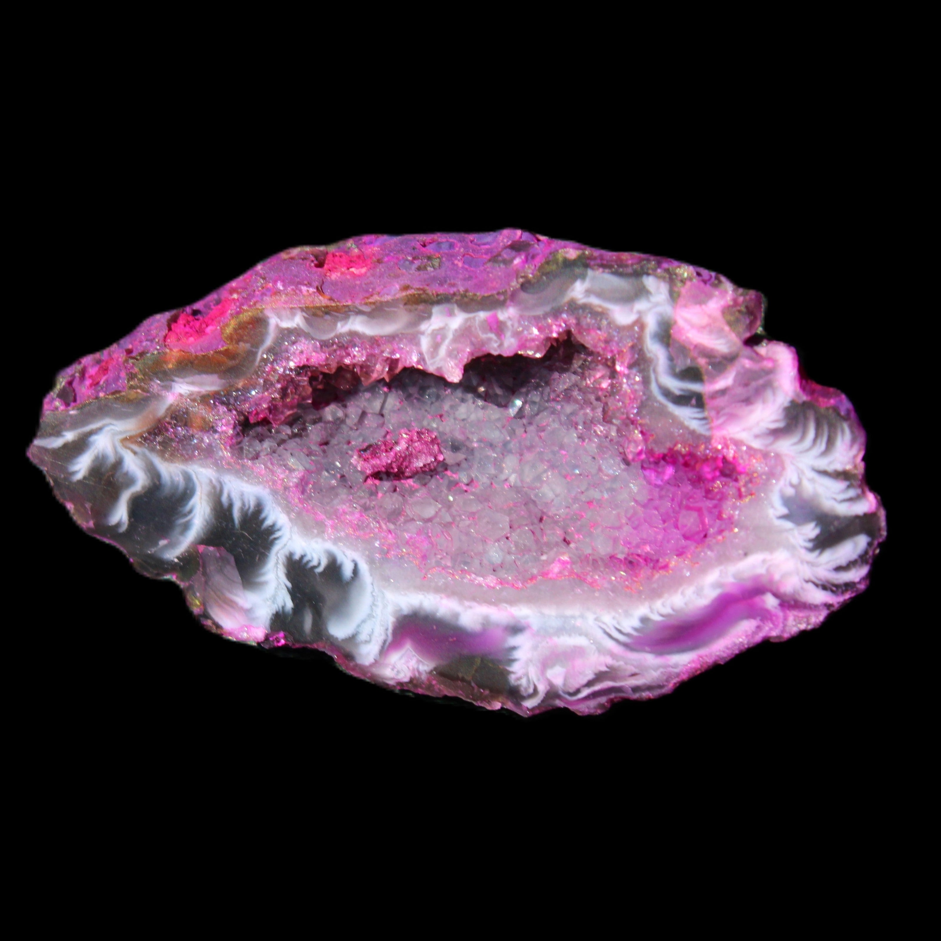 Magenta dyed Agate geode 49*21*15mm 21g in sunlight - Rocks and Things Store