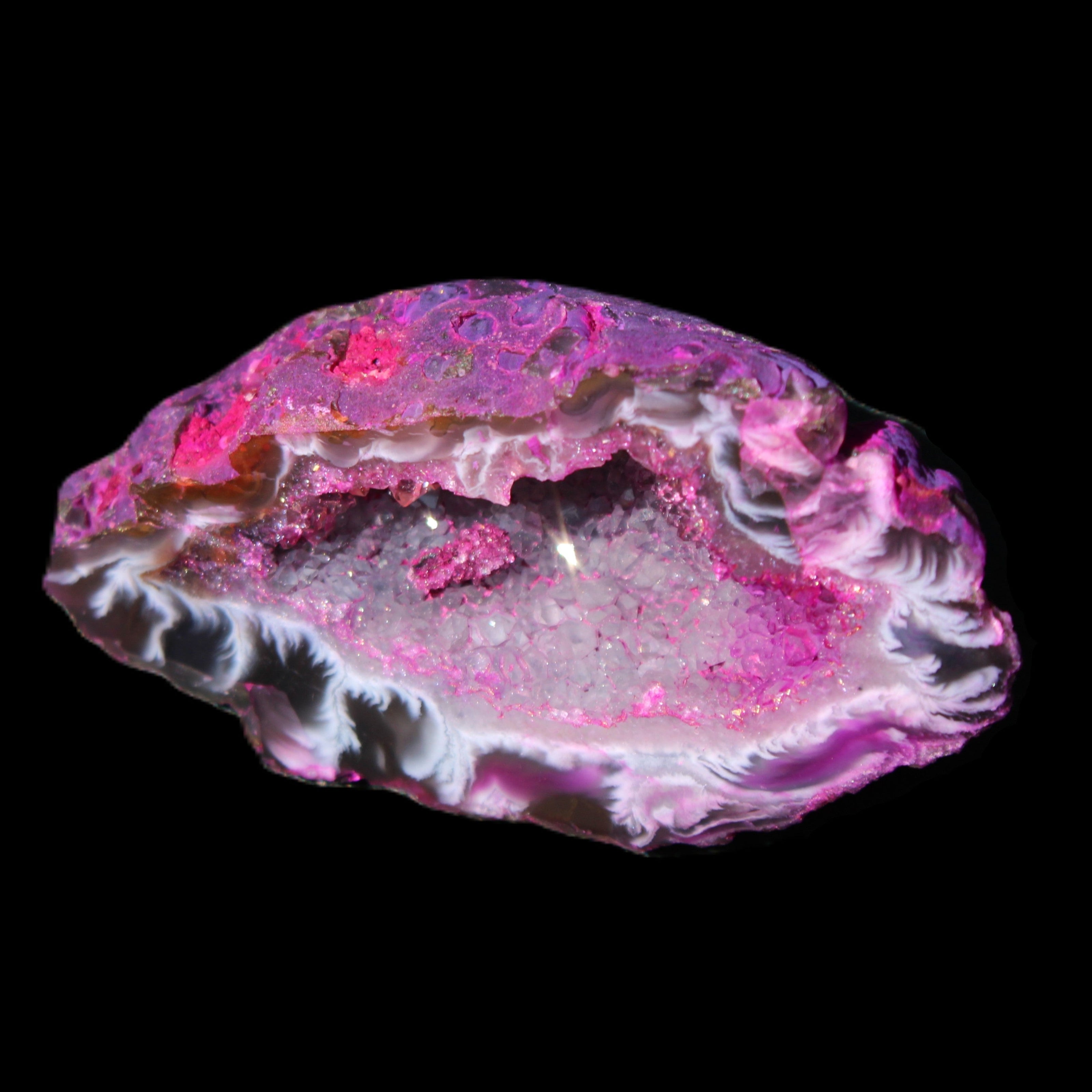 Magenta dyed Agate geode 49*21*15mm 21g in sunlight - Rocks and Things Store