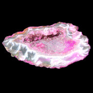 Magenta dyed Agate geode 49*21*15mm 21g in sunlight - Rocks and Things Store