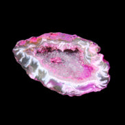 Magenta dyed Agate geode 49*21*15mm 21g in sunlight - Rocks and Things Store