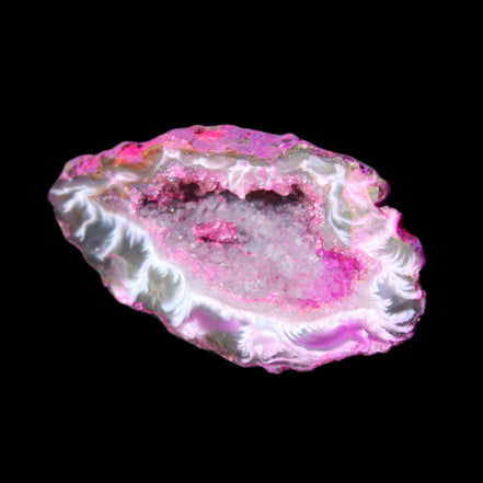 Magenta dyed Agate geode 49*21*15mm 21g in sunlight - Rocks and Things Store