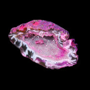 Magenta dyed Agate geode 49*21*15mm 21g in sunlight - Rocks and Things Store