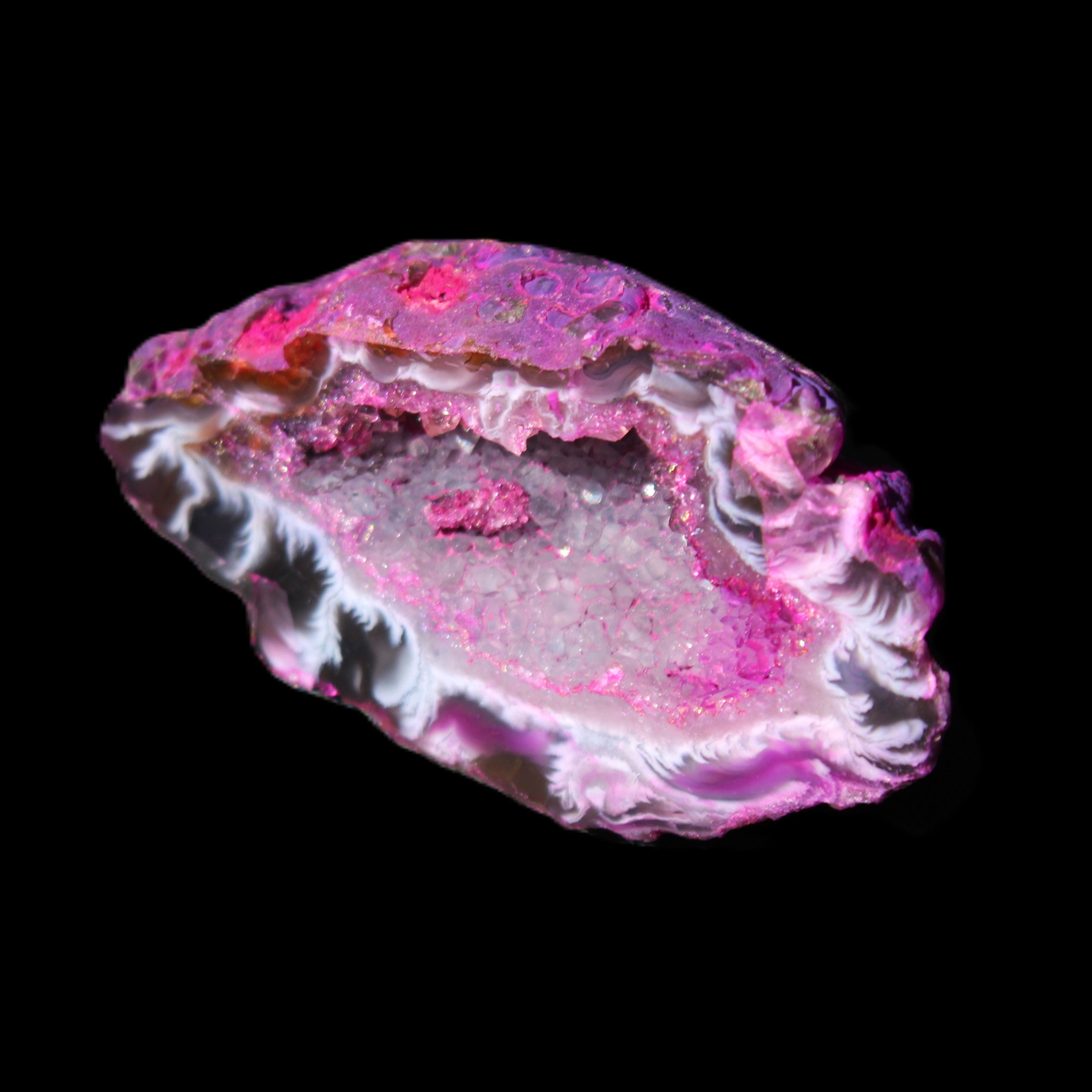 Magenta dyed Agate geode 49*21*15mm 21g in sunlight - Rocks and Things Store