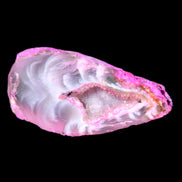 Magenta dyed Agate geode 41*22*14mm 20g in sunlight - Rocks and Things Store