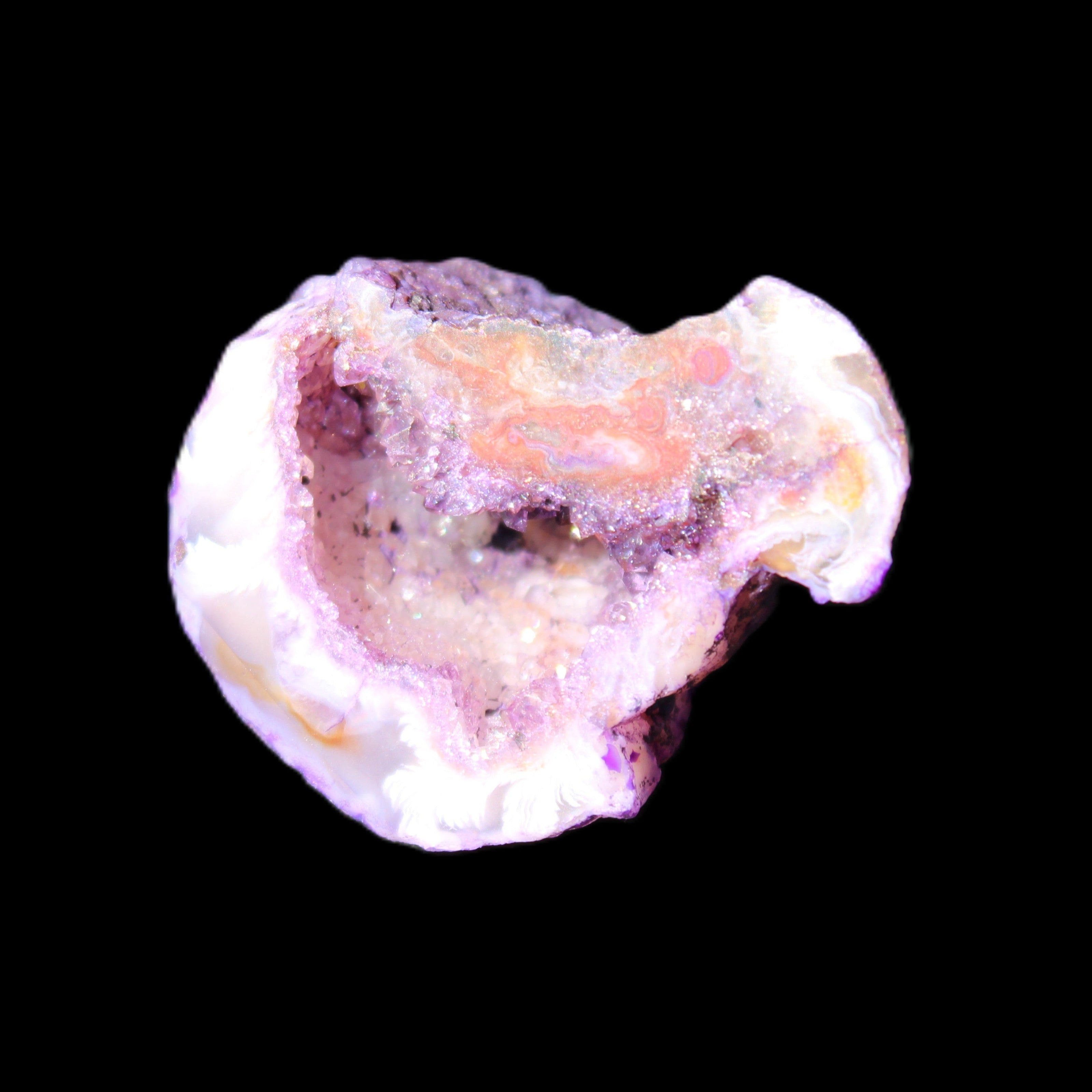 Violet dyed Agate geode 37*28*22mm 21g in sunlight - Rocks and Things Store