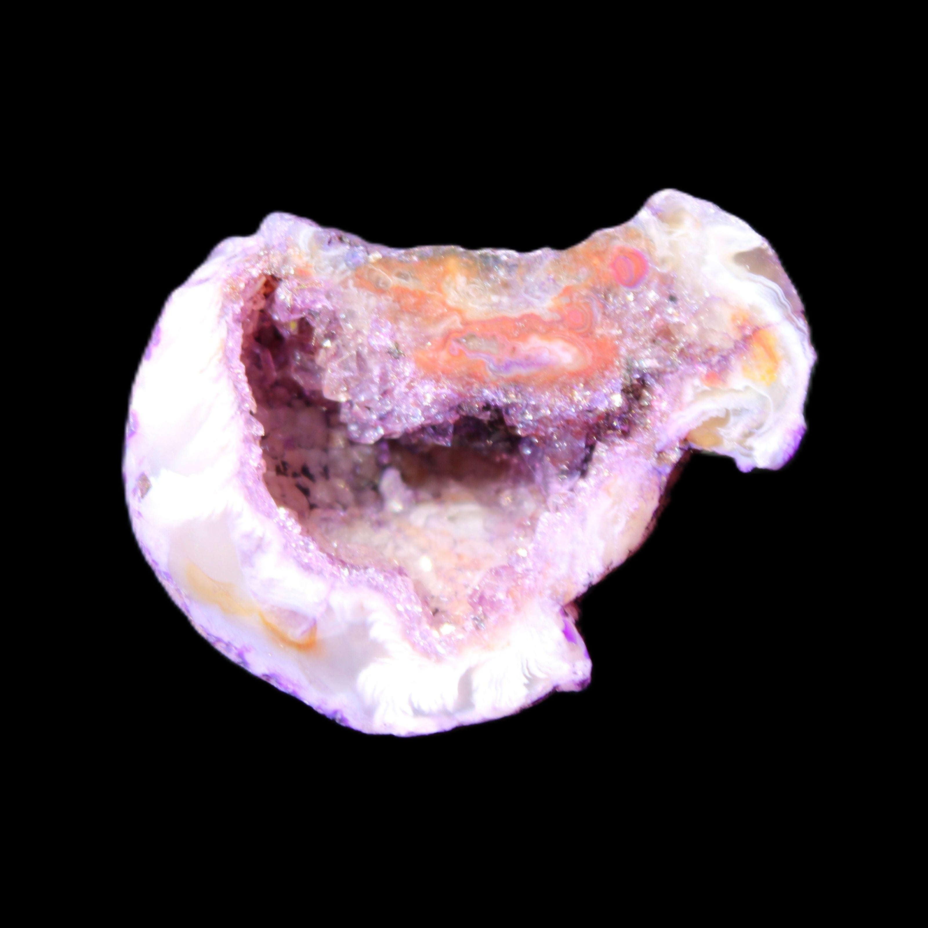 Violet dyed Agate geode 37*28*22mm 21g in sunlight - Rocks and Things Store