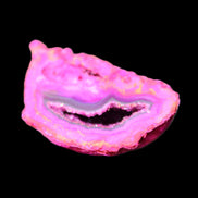 Magenta dyed Agate geode 44*25*18mm 17g in sunlight - Rocks and Things Store