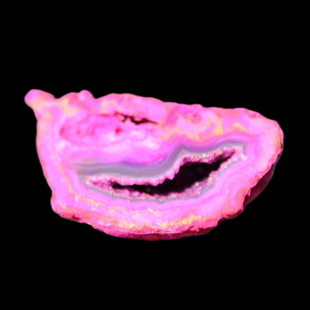 Magenta dyed Agate geode 44*25*18mm 17g in sunlight - Rocks and Things Store