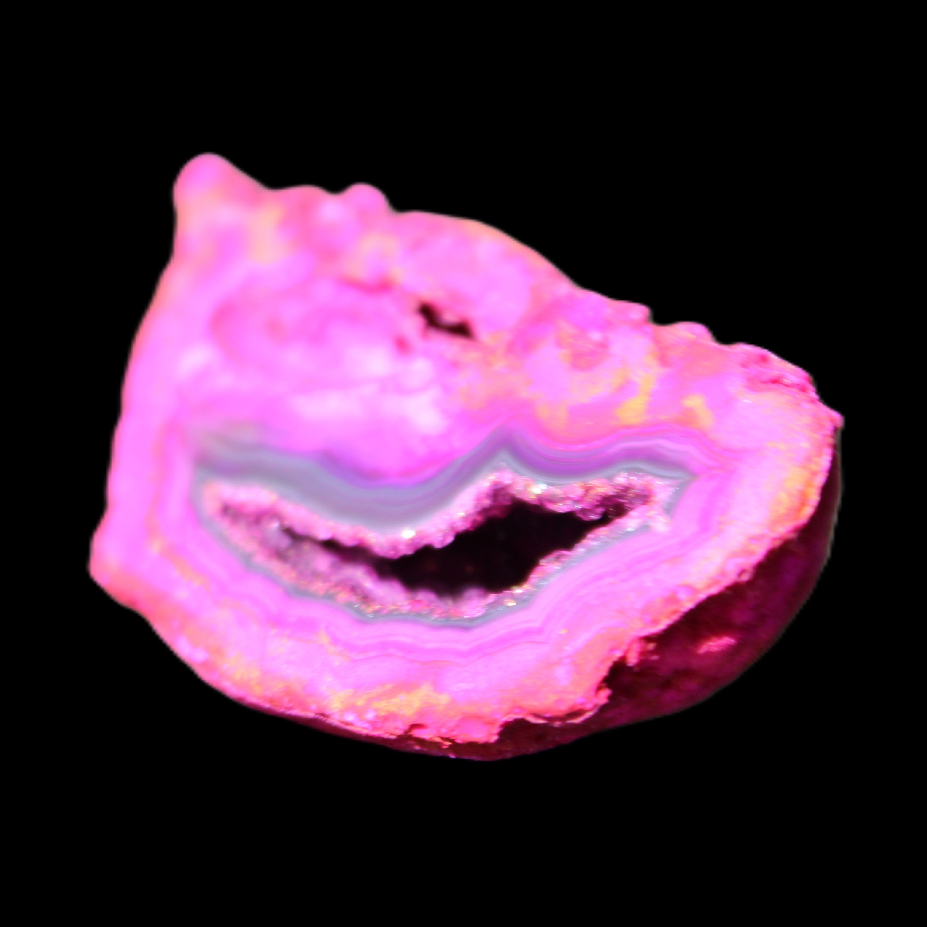 Magenta dyed Agate geode 44*25*18mm 17g in sunlight - Rocks and Things Store