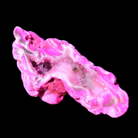 Magenta dyed Agate geode 52*24*16mm 15.5g in sunlight - Rocks and Things Store