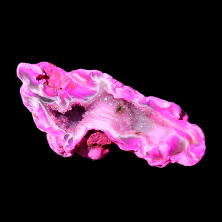 Magenta dyed Agate geode 52*24*16mm 15.5g in sunlight - Rocks and Things Store