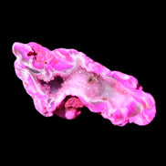 Magenta dyed Agate geode 52*24*16mm 15.5g in sunlight - Rocks and Things Store