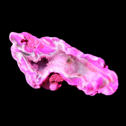 Magenta dyed Agate geode 52*24*16mm 15.5g in sunlight - Rocks and Things Store