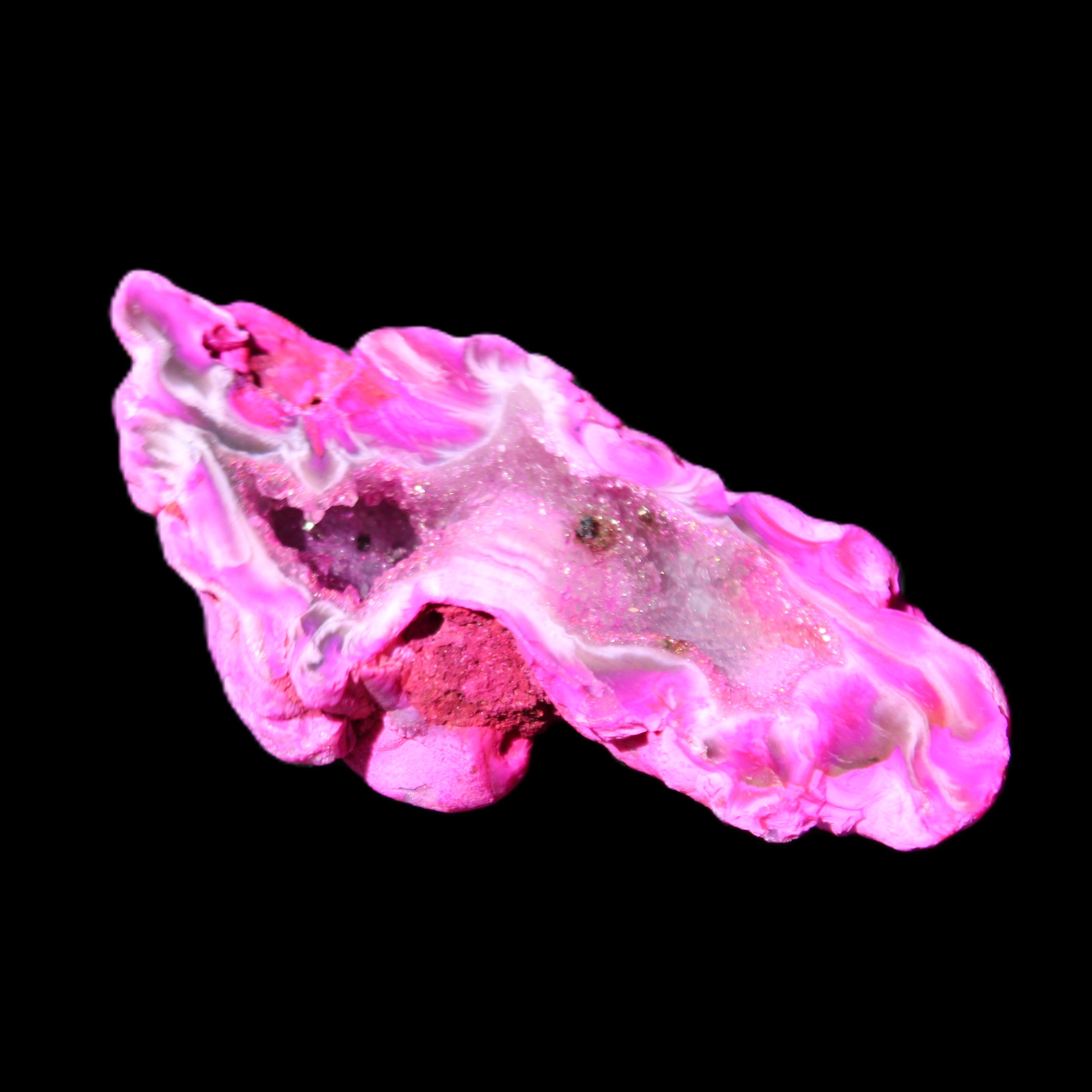 Magenta dyed Agate geode 52*24*16mm 15.5g in sunlight - Rocks and Things Store