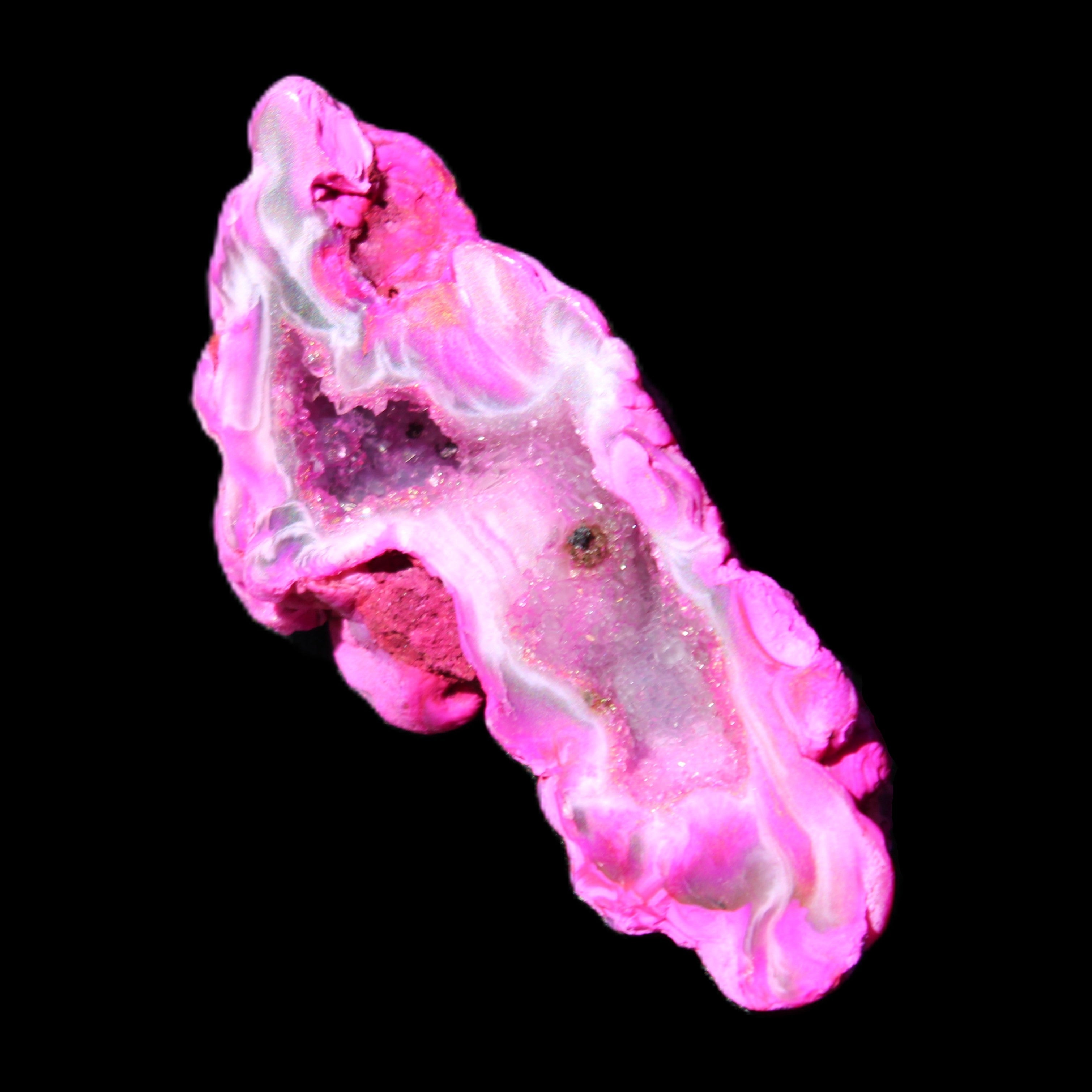Magenta dyed Agate geode 52*24*16mm 15.5g in sunlight - Rocks and Things Store