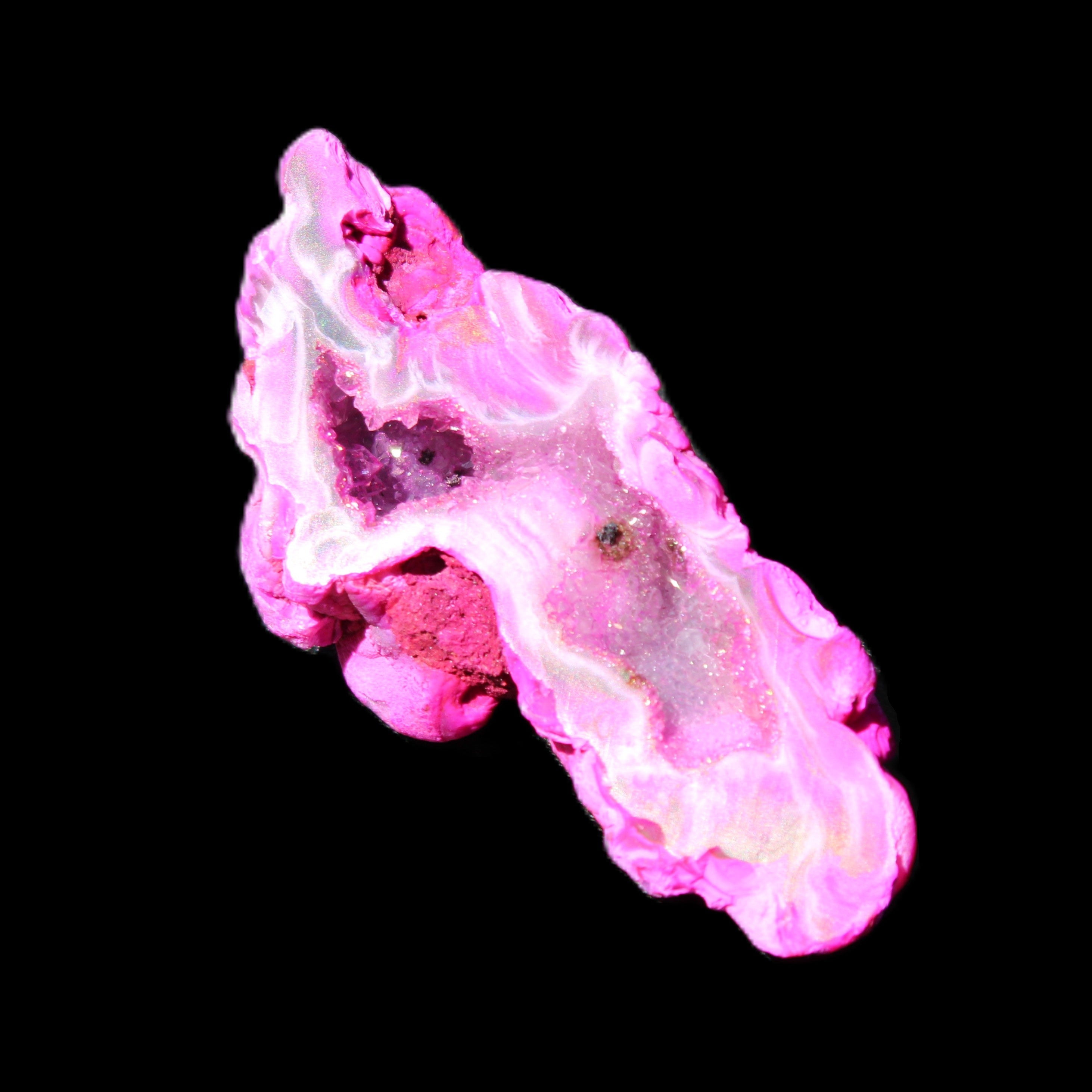 Magenta dyed Agate geode 52*24*16mm 15.5g in sunlight - Rocks and Things Store