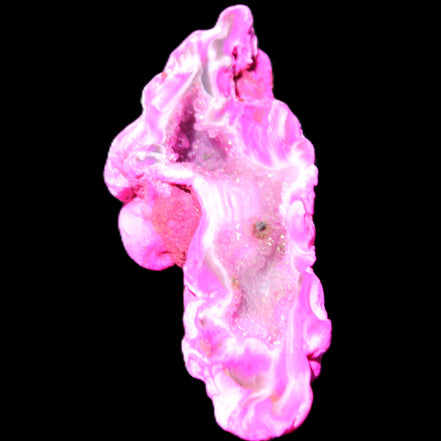 Magenta dyed Agate geode 52*24*16mm 15.5g in sunlight - Rocks and Things Store