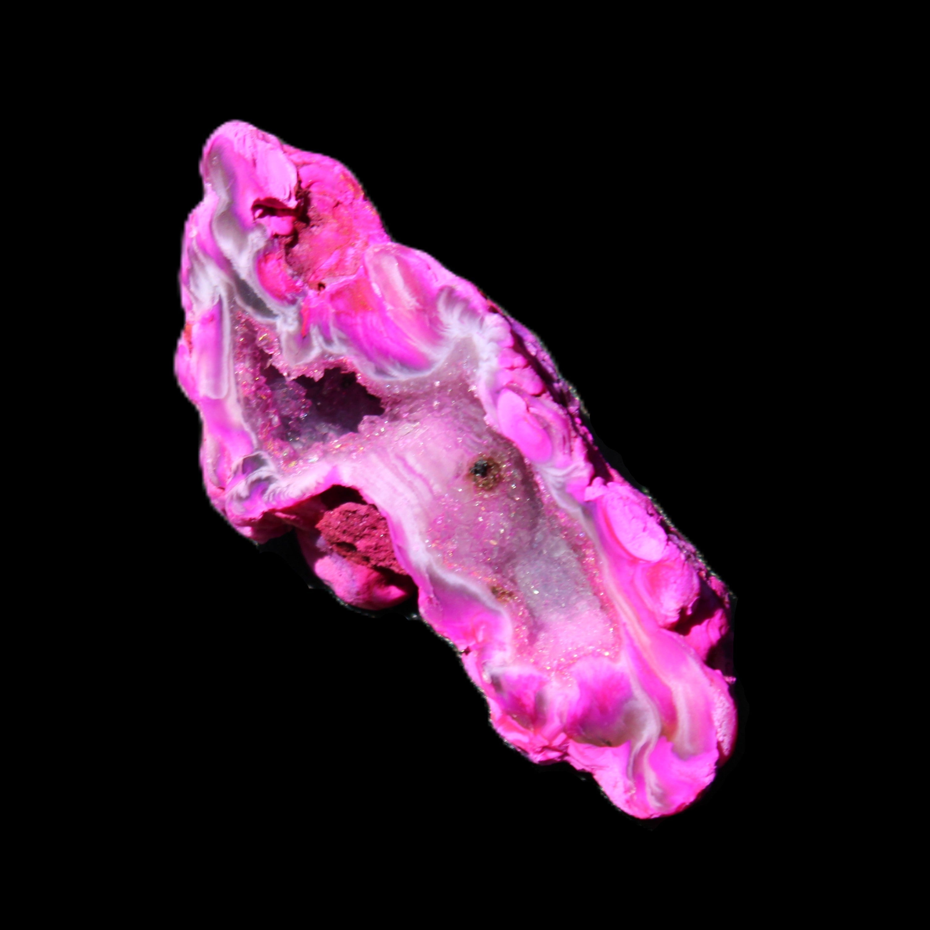 Magenta dyed Agate geode 52*24*16mm 15.5g in sunlight - Rocks and Things Store