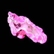 Magenta dyed Agate geode 52*24*16mm 15.5g in sunlight - Rocks and Things Store